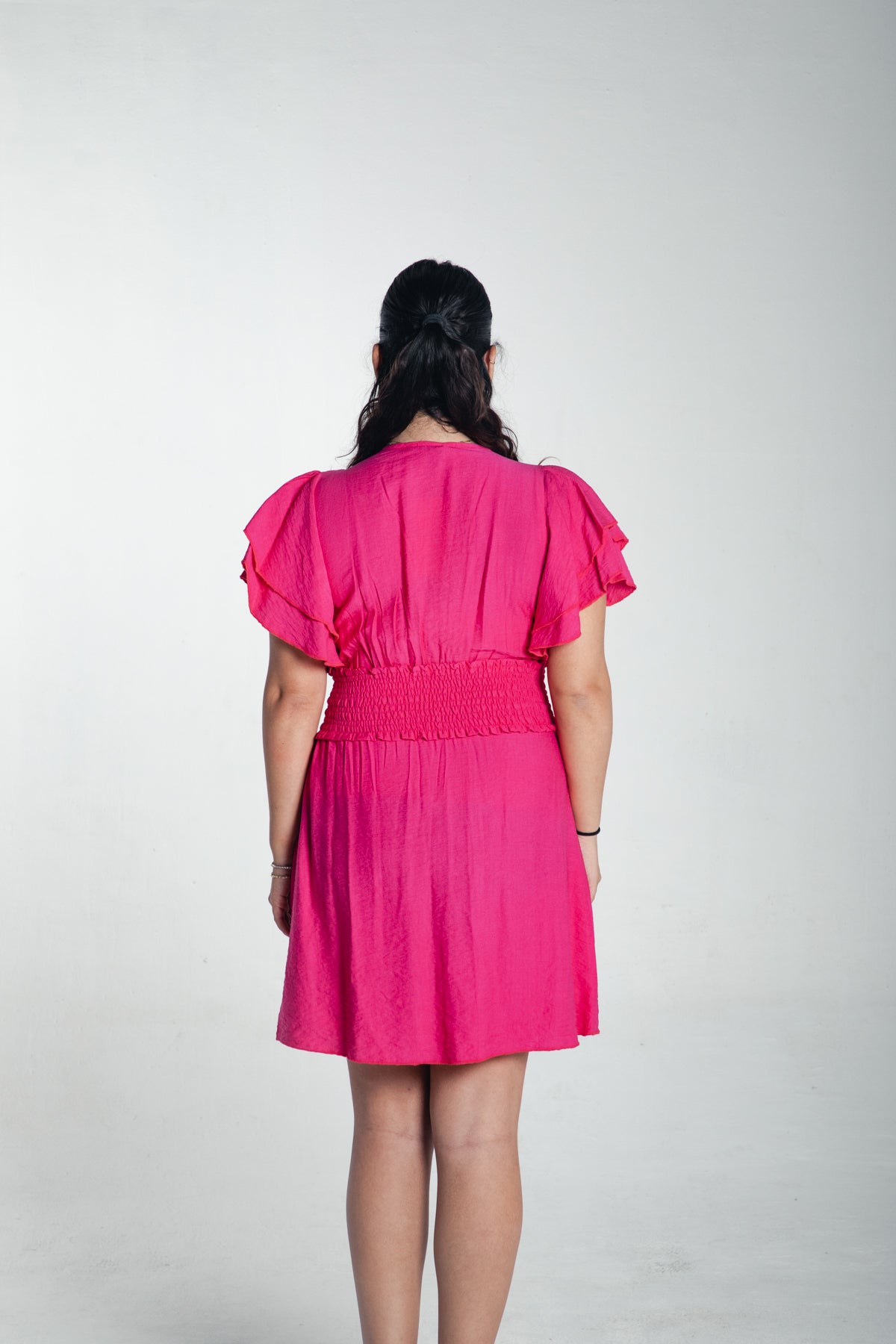 pink ruffled dress
